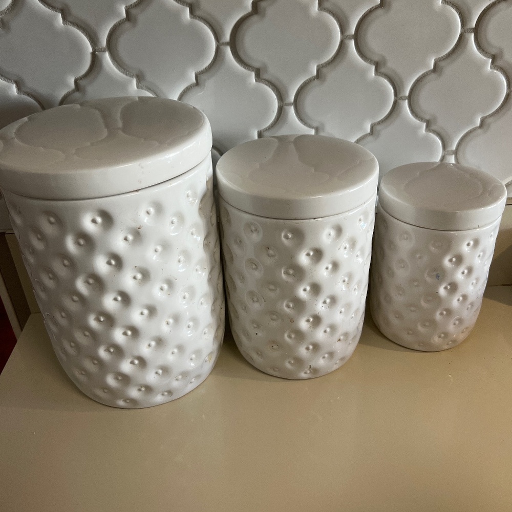 3 white textured kitchen canisters